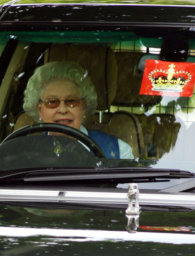 WINDSOR, ENGLAND - MAY 10: Queen Elizabeth drives a Range Rover during day three of the Royal Windsor Horse Show on May 10, 2008 in Windsor, England. (Photo by Samir Hussein/Getty Images)