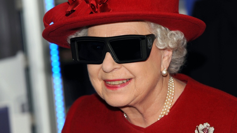 Queen Elizabeth II wears 3-D glasses during a visit to the University of Sheffield, in 2010. This year, the queen's annual Christmas message will broadcast in 3-D.